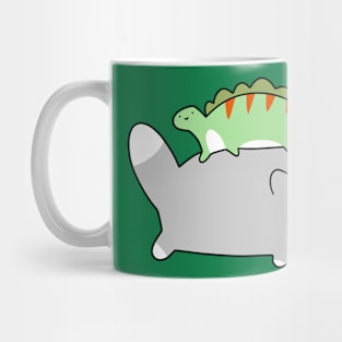 A cute blue tuxedo cat and tiny green stegosaurus. Mug